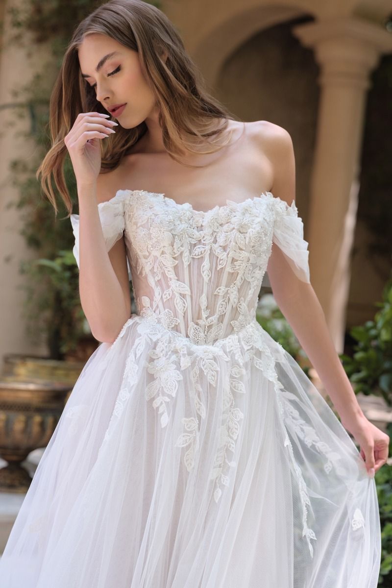 Wedding Ball Gown An Off-The-Shoulder Illusion Bodice Adorned With Cascading Floral Lace Appliqué And Dimensional Textures